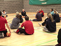 Adults training to teach Mini-Basketball